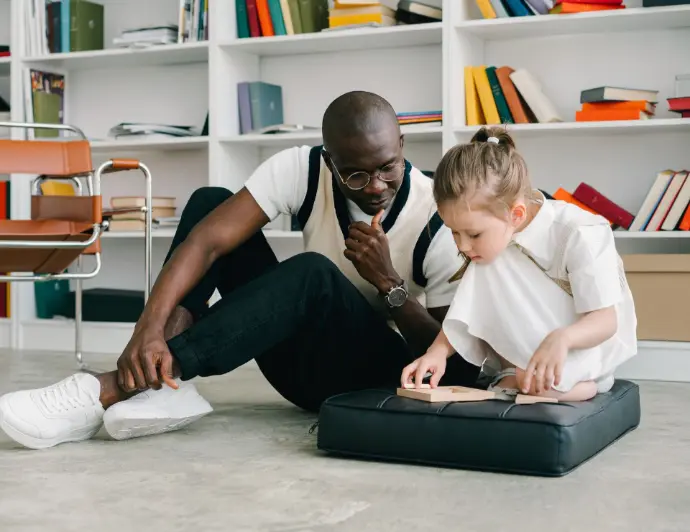 Caregiver helping child